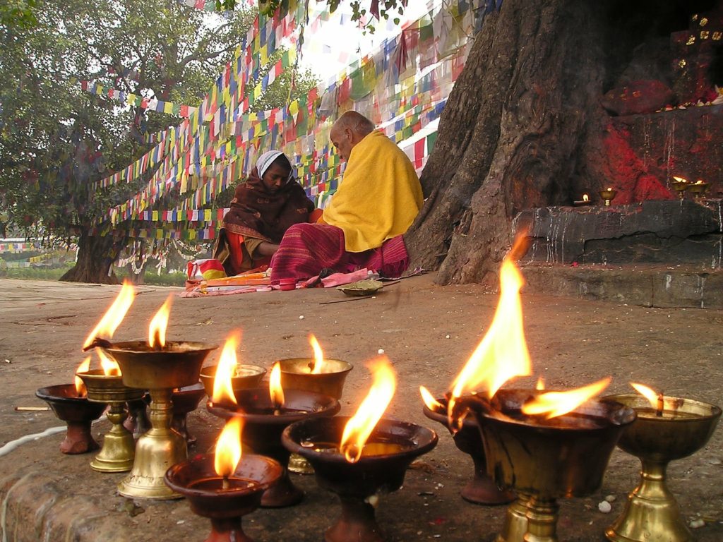 Traditional oil lamps burning during a cultural celebration in Nepal